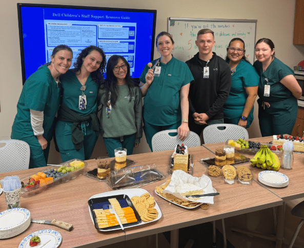 Pharmacy residents having lunch in a conference room
