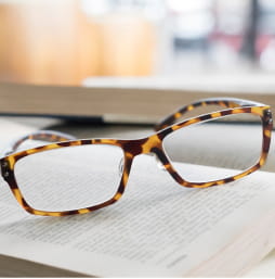 Glasses and book