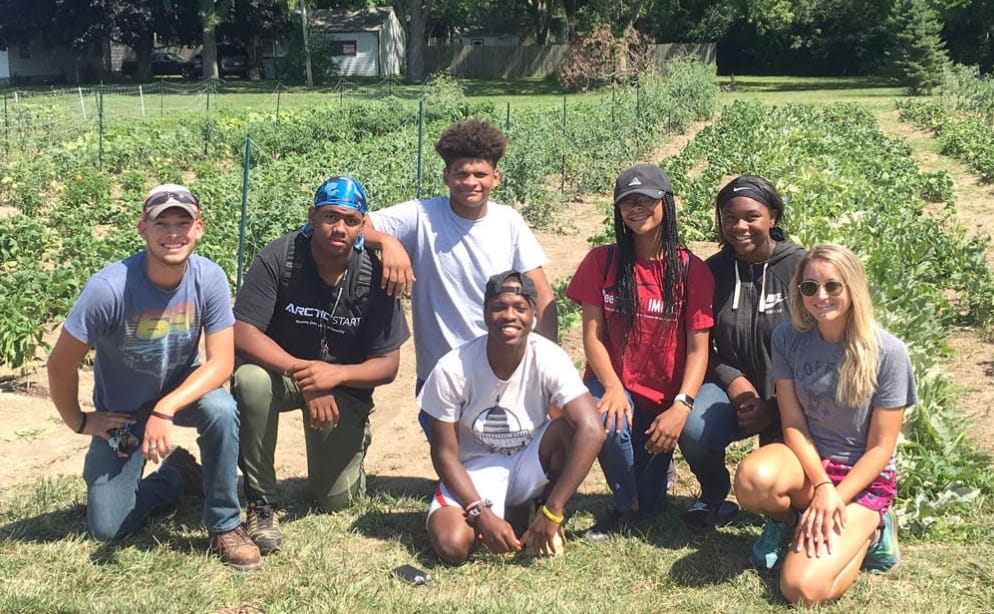 Interns volunteering in Ascension WI Family Practice garden